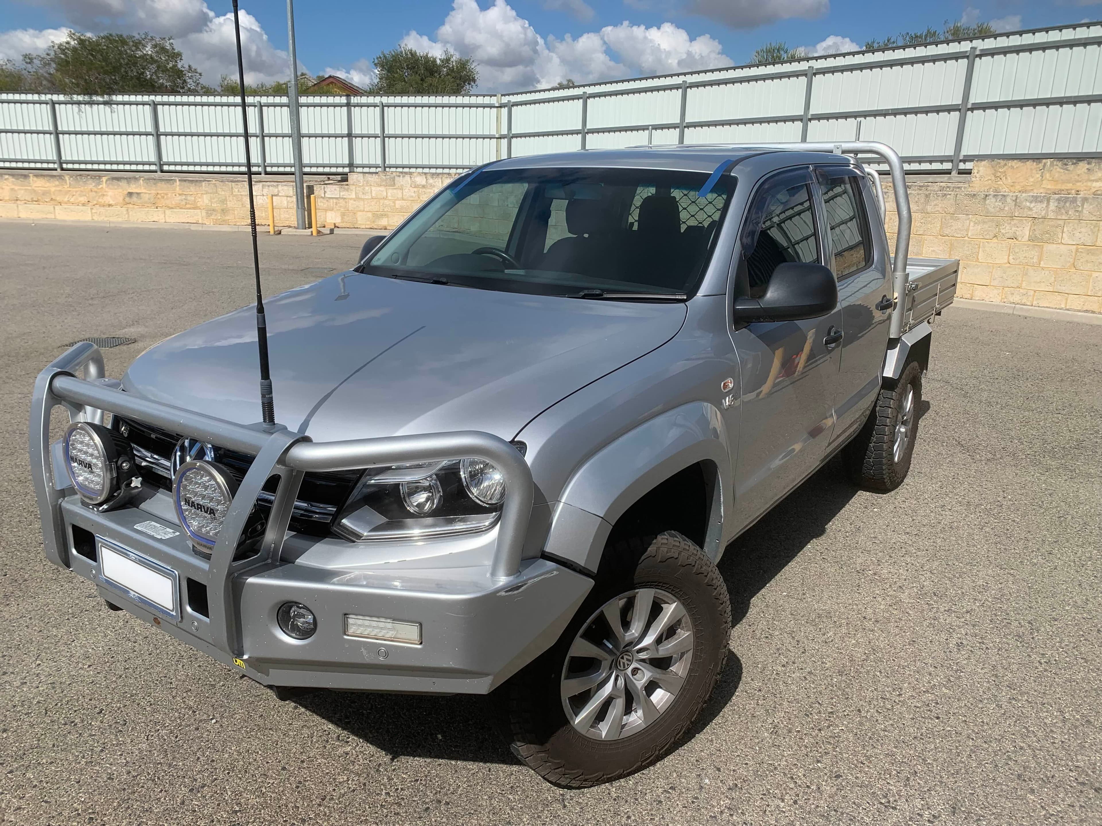 Silver dual-cab ute with a new windscreen fitted